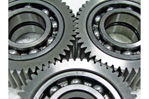 Three meshed spur gears
