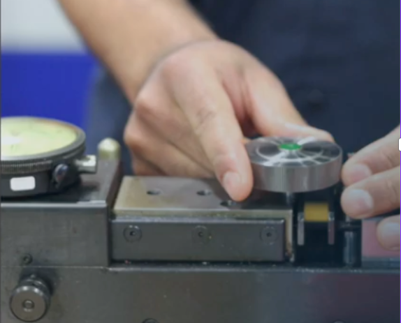 engineer testing a gear during design