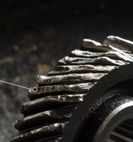 Worn teeth on a helical gear